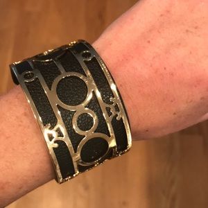 Black leather and gold cuff bracelet